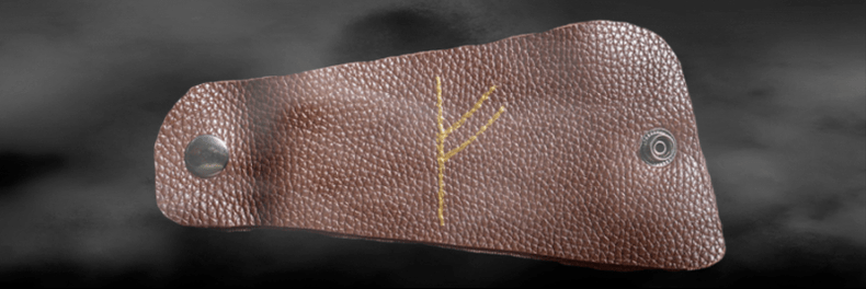 Fehu rune dina kulit salaku jimat tina alus tuah